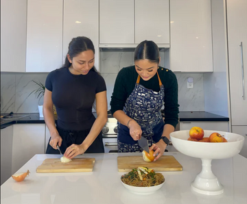 two ladies making food